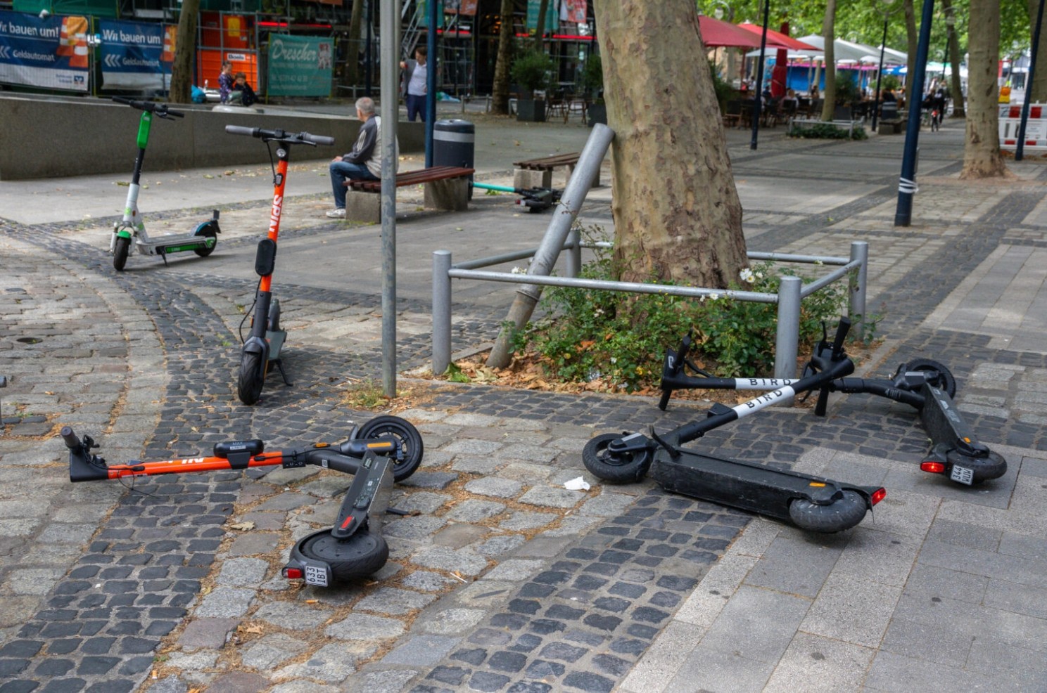 Should cities charge fees for e-scooters to solve the known problems?